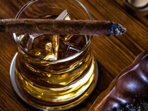 The Cigar Store Whisky on the rocks and a cigar